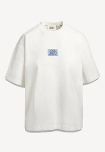 Kremowy t-shirt oversize PARADISO z logo